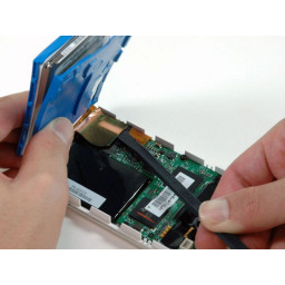 Замена кабеля жесткого диска iPod 3-го поколения